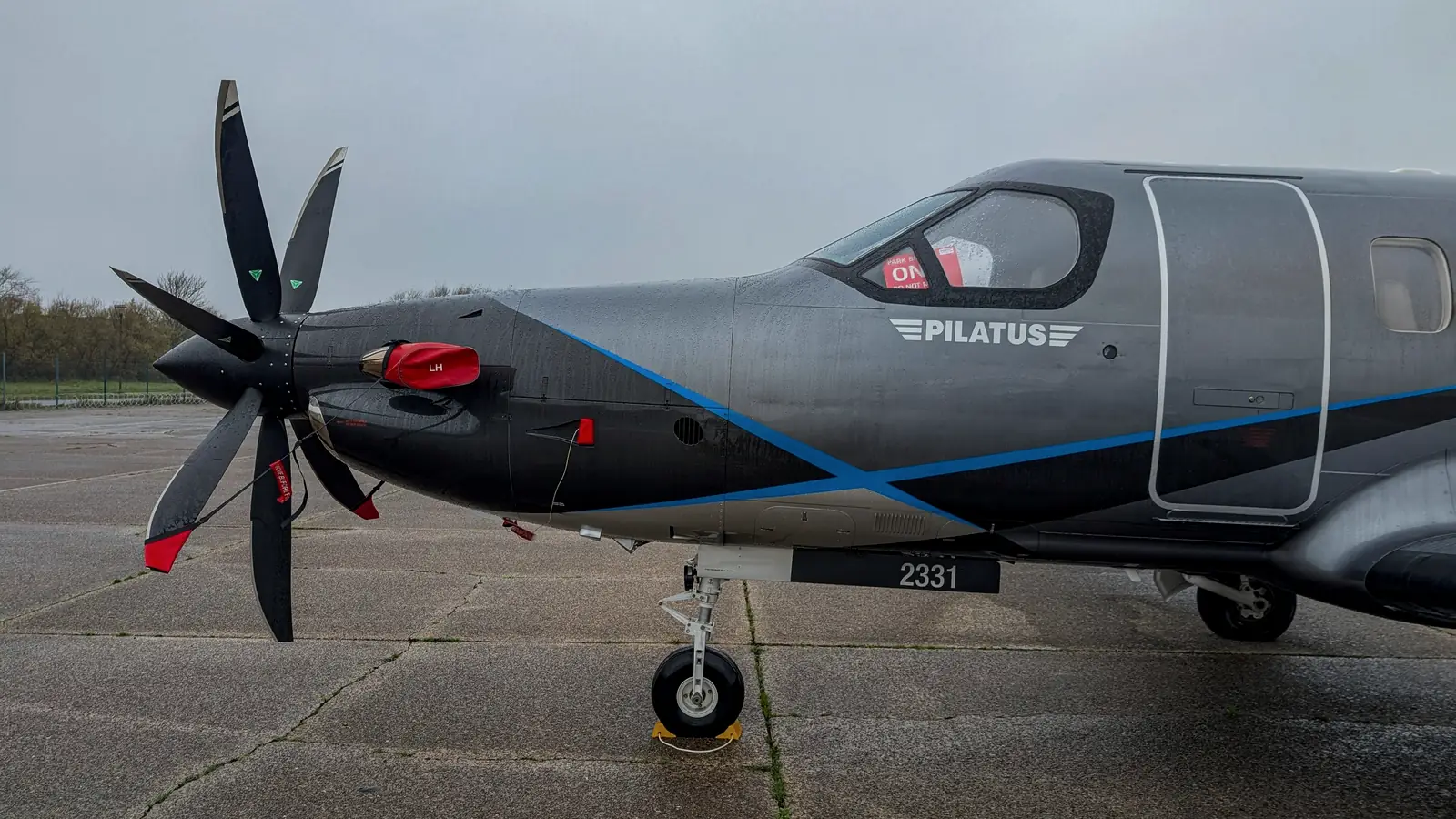 Five-blade propeller and short landing gear: the field performance a jet cannot match.